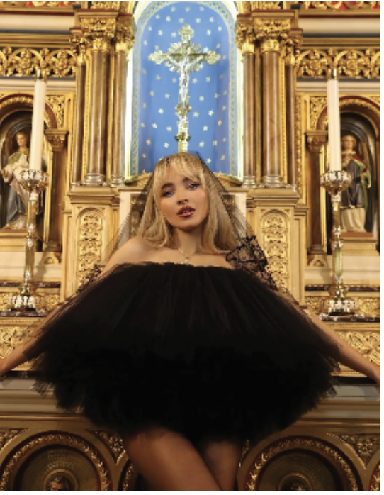 Sabrina Carpenter poses for her music video “Feather,” filmed at the Annunciation of the Blessed Virgin Mary. Photo by Alfredo Flores.