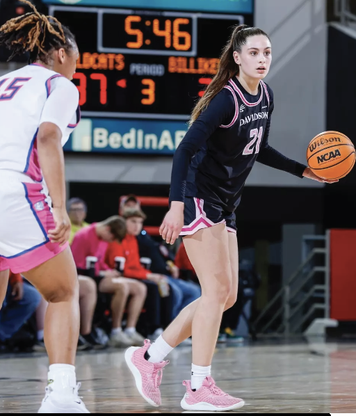 Charlise Dunn ‘26 sets up a play against Saint Louis. Photo by Tim Cowie