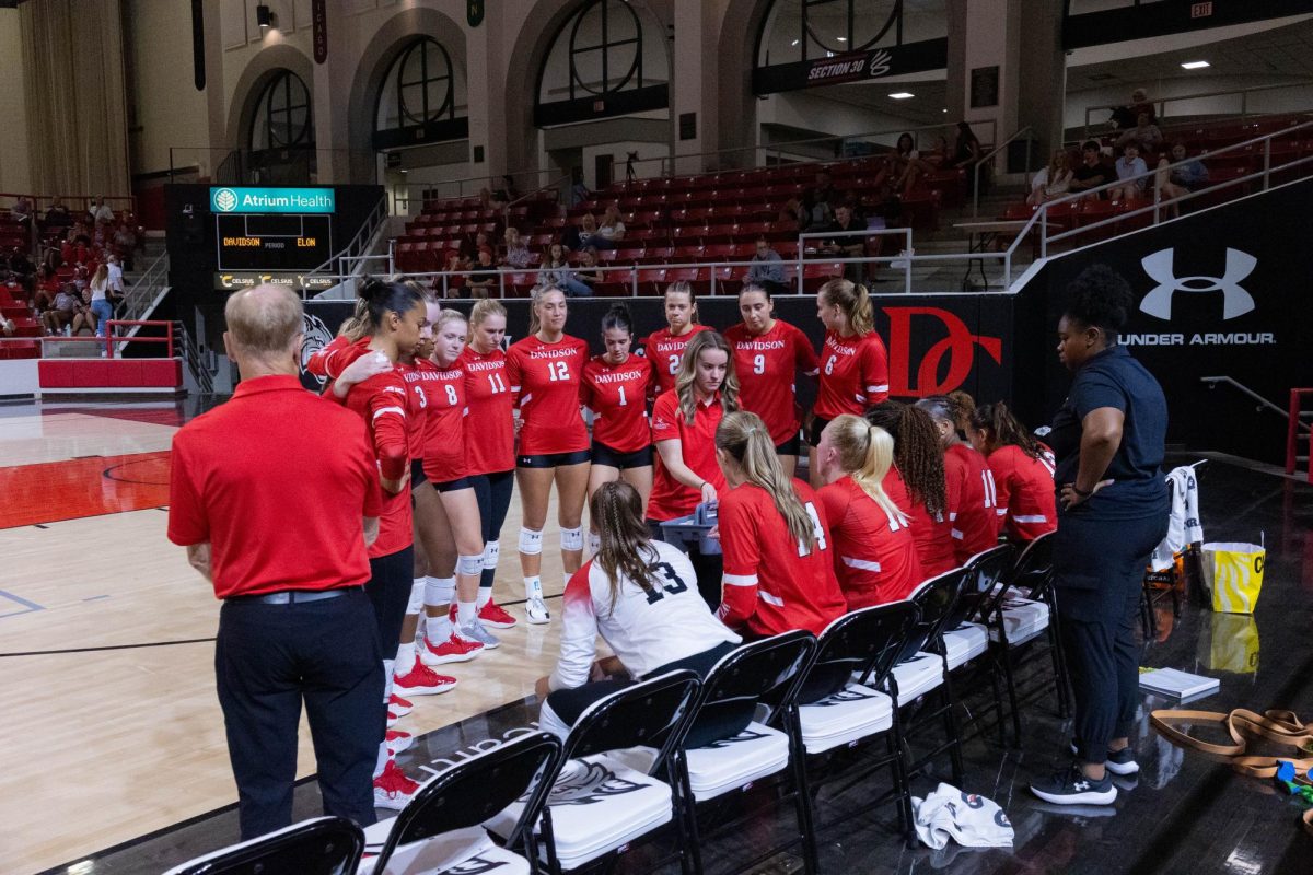 Volleyball huddles in between sets. 