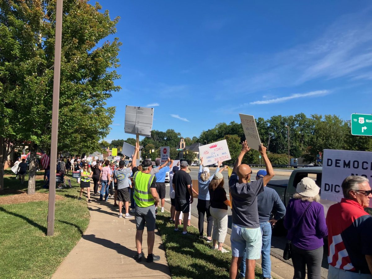 Protestors gather in Davidson, NC on Labor Day.