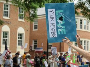 Sign held during a protest in the Town of Davidson earlier this summer.