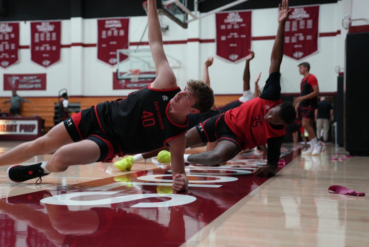 John Nowland ‘27 training with the men’s basketball team. Photo courtesy of John Nowland.