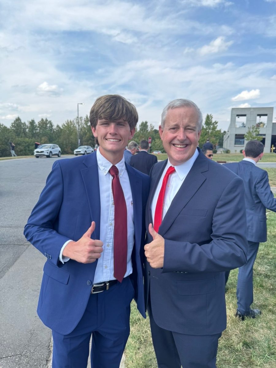 TPUSA President Oliver Genovese ‘28 stands with former chairman of the Republican National Committee Michael Whatley. Photo courtesy of Oliver Genovese ‘28.