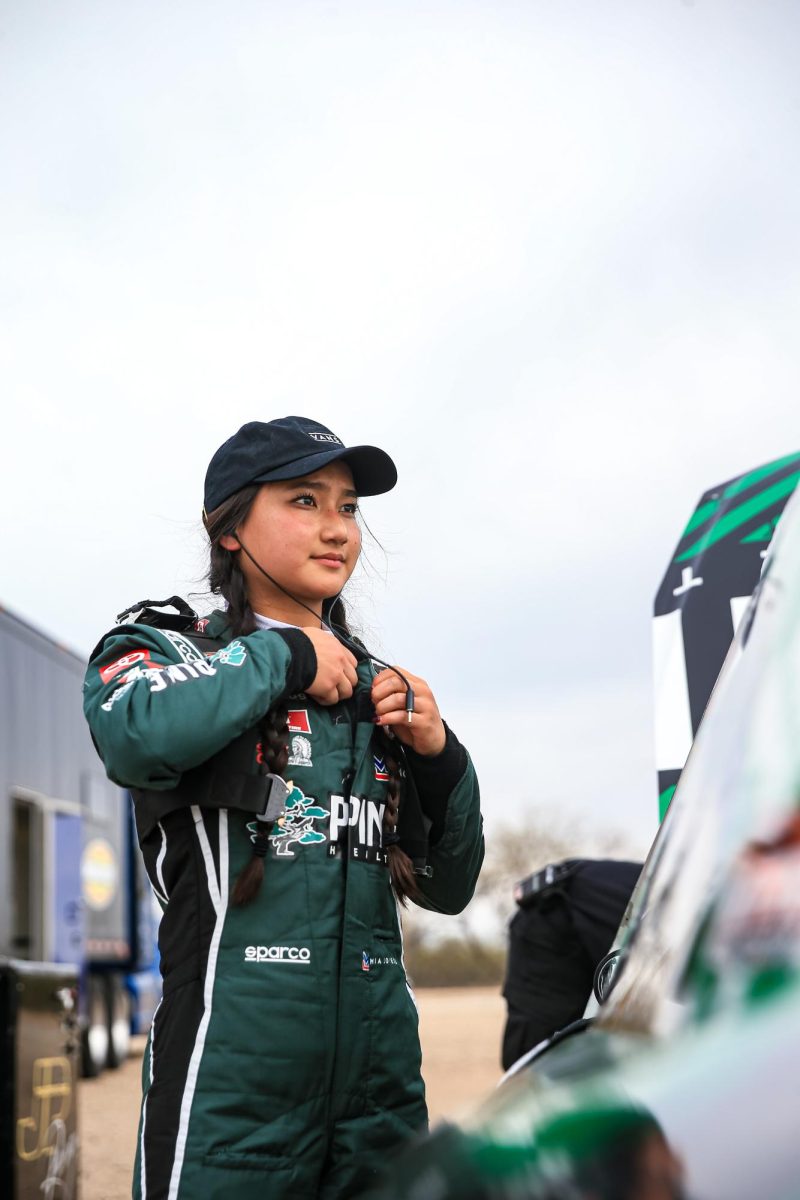 Mia Lovell ‘29 suits up before a race.  