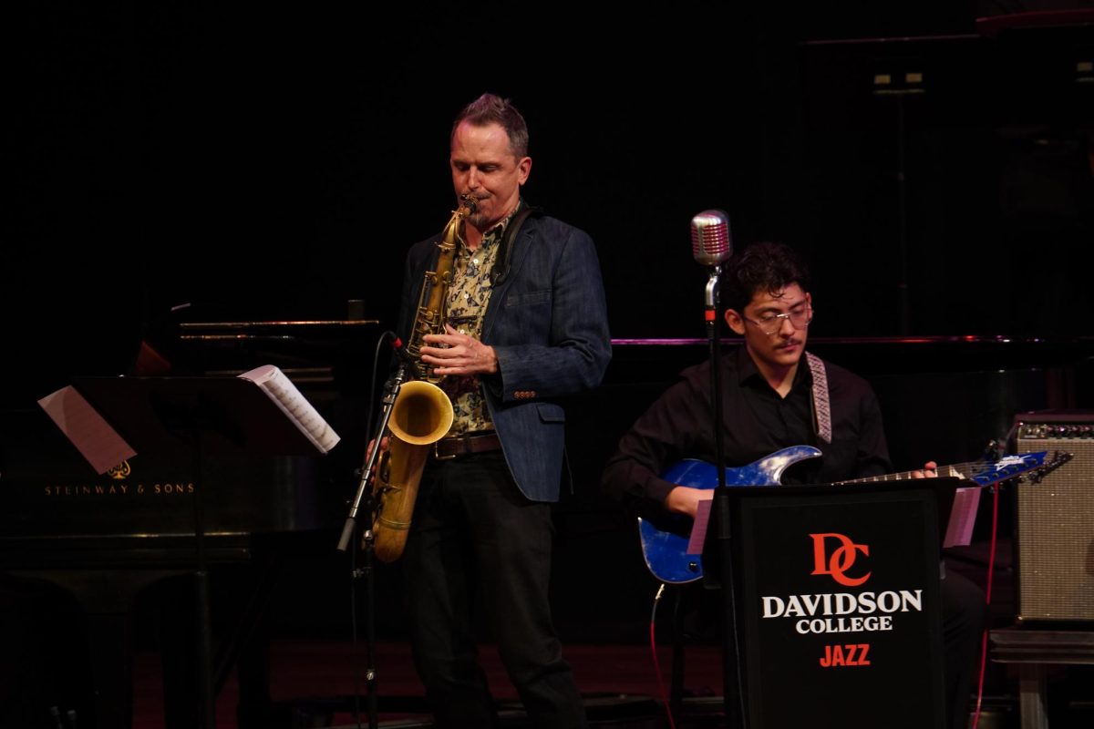 John Ellis (left) performs in the Duke Family Performance Hall on Saturday, Feb. 21. 
