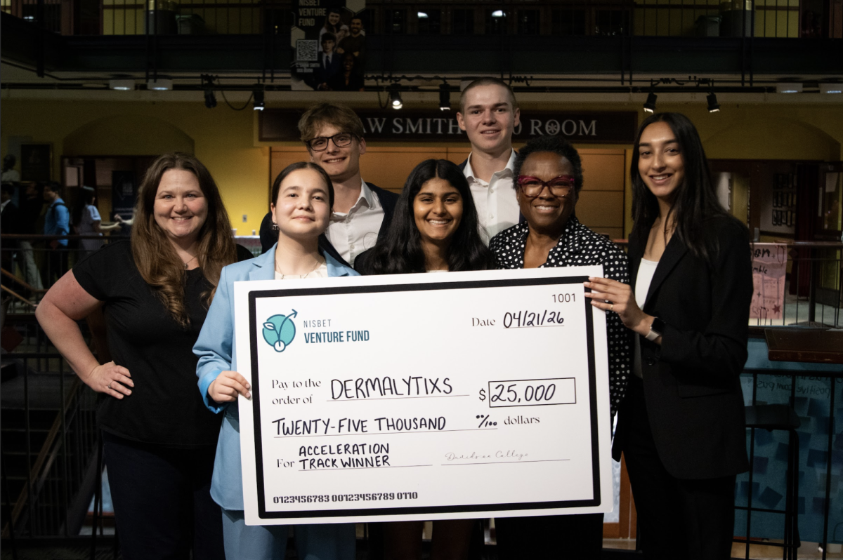 The winners of the Nisbet Venture Funds acceleration track, Dermalytixs, pose with their $25,000 check. Dermalytixs proespective product is a rapid test strip that will be able to test for the deadly pathogen, Pseudomonas Aeruginosa, a bacteria that is most common in causing infection among humans.